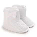 chaussons bébé en laine avec nœud papillon