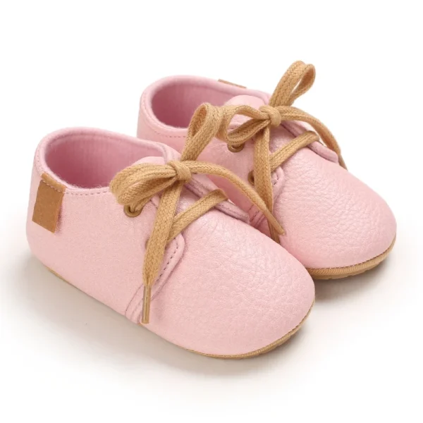 Chaussons bébé fille en cuir rose élégants