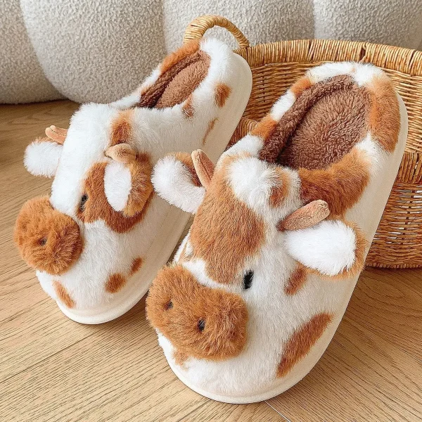 Chaussons vache confort antidérapants sur fond blanc