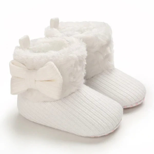 chaussons bébé en laine avec nœud papillon en fourrure